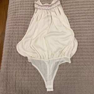 Free people white bodysuit size L new with tags